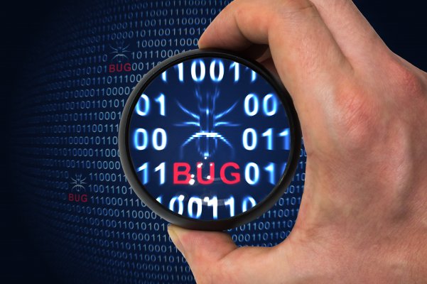 registry cleaners regclean pro hand with magnifying glass over red bug text in binary code 0 and 1